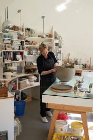 Alice Corbett working from home in her ceramics studio